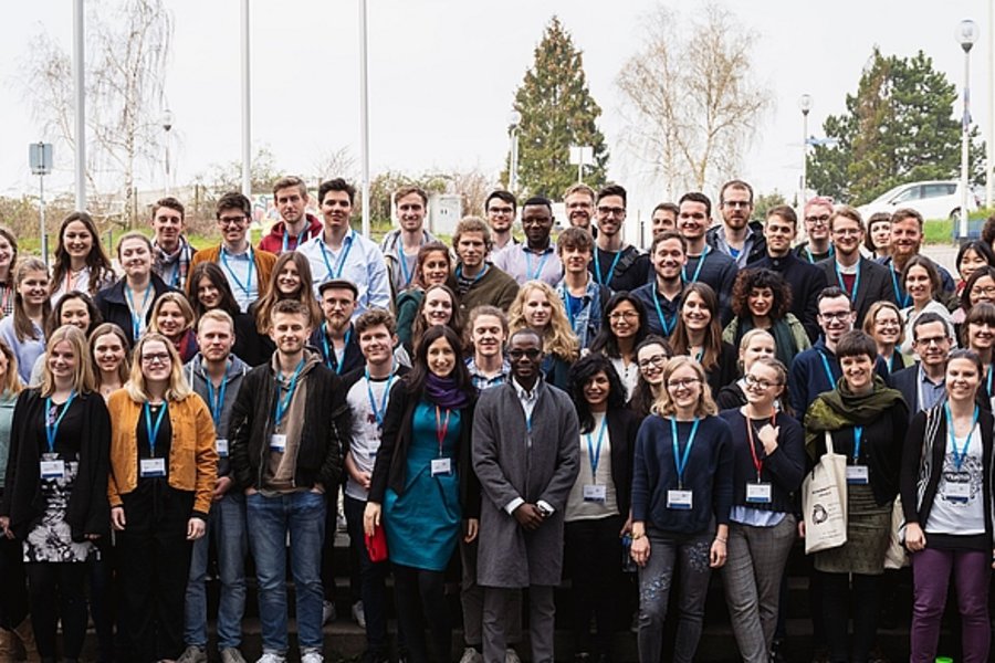 All attendees of the PPE Conference 2019 gather for a group picture in front of the University  